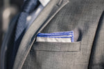 white cotton pocket square navy tip gray suit