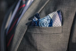 Navy Paisley silk pocket square blue polka dots white border foundation menswear gray suit
