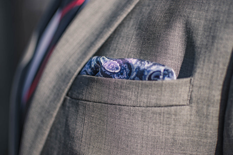 Navy silk pocket square micro chain pattern light blue paisley foundation menswear gray suit